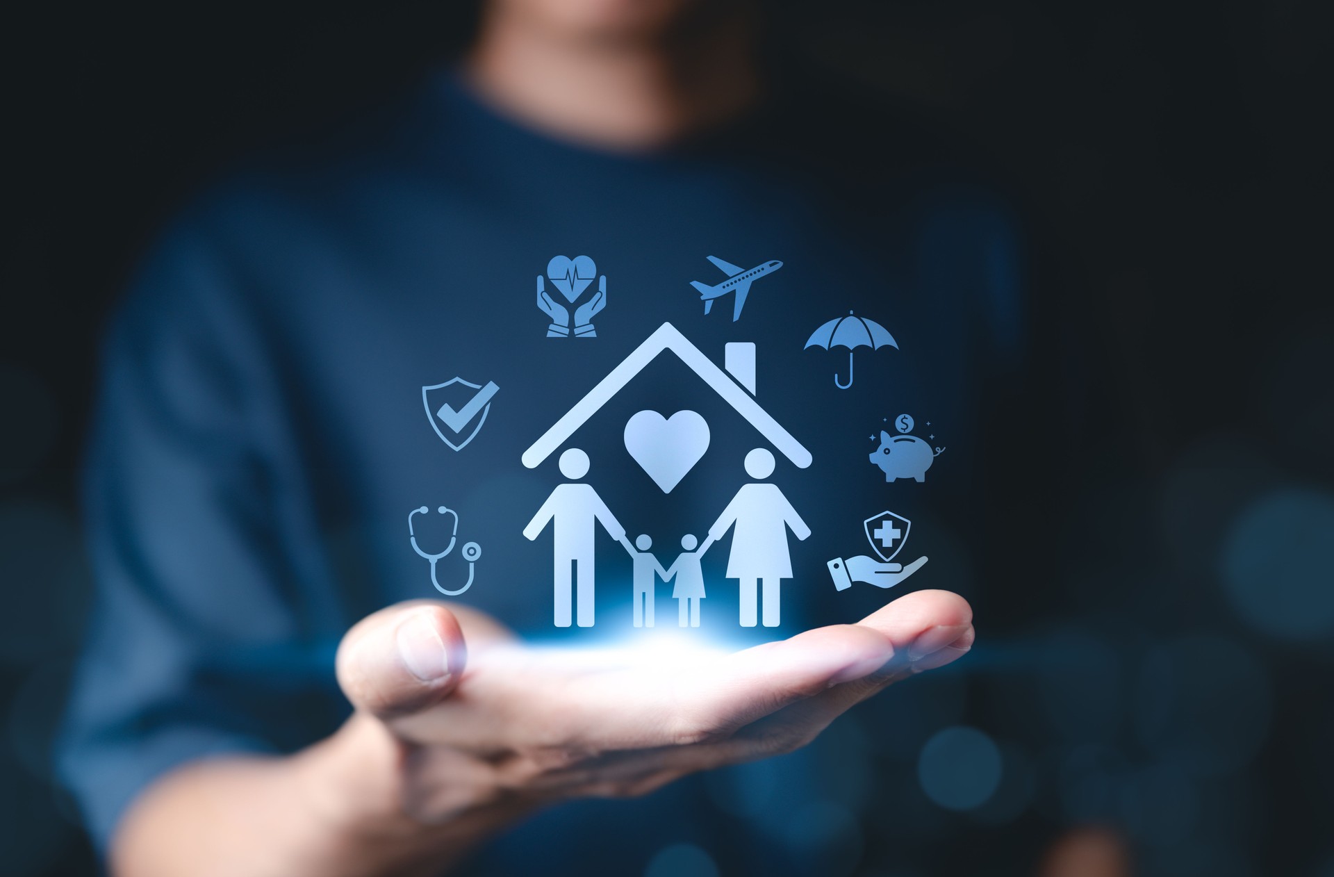 Family Health Insurance Concept. A hand presenting glowing icons representing family health insurance, protection, safety, medical care, financial security, and wellness. life insurance,